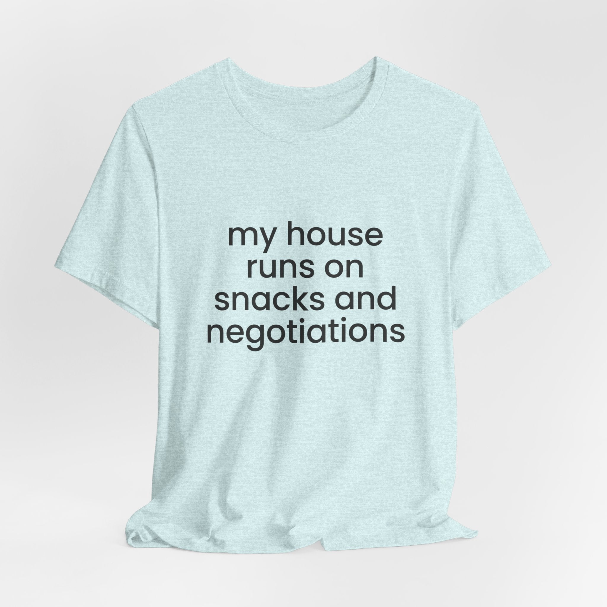 T‑Shirt — "My House Runs on Snacks and Negotiations" Funny Family Tee