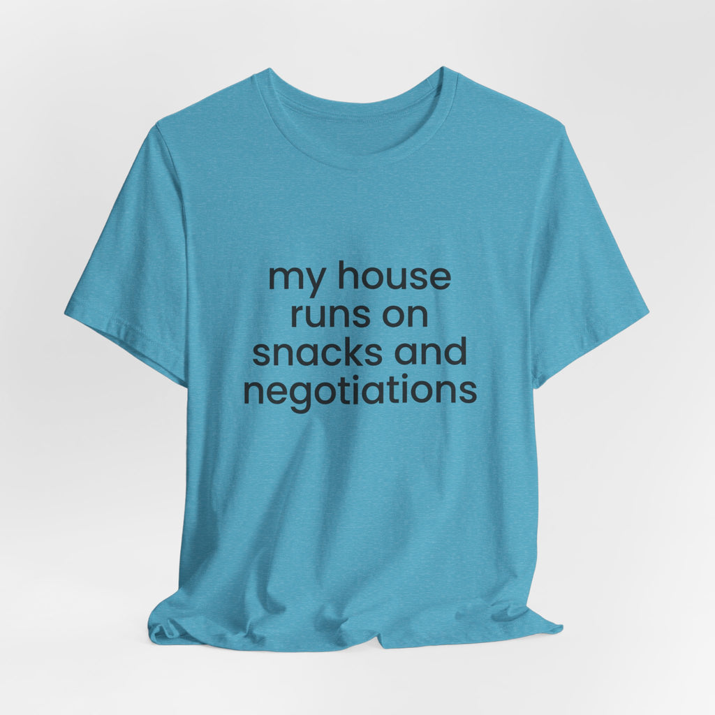 T‑Shirt — "My House Runs on Snacks and Negotiations" Funny Family Tee
