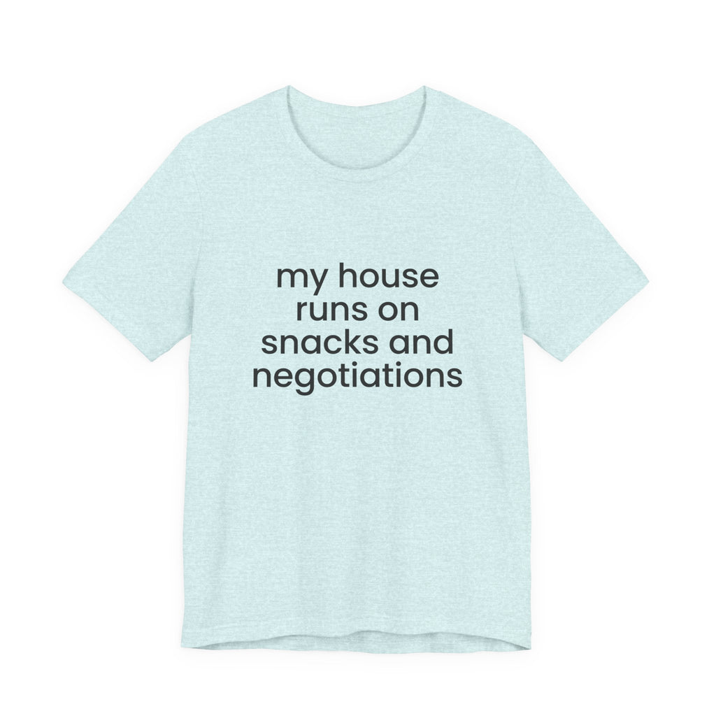T‑Shirt — "My House Runs on Snacks and Negotiations" Funny Family Tee