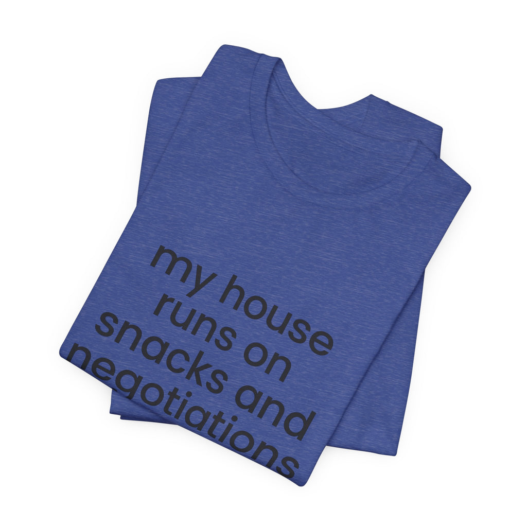 T‑Shirt — "My House Runs on Snacks and Negotiations" Funny Family Tee