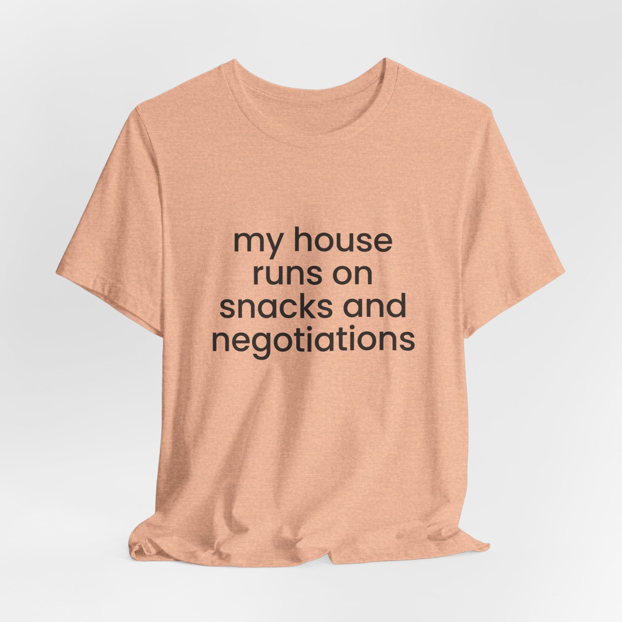T‑Shirt — "My House Runs on Snacks and Negotiations" Funny Family Tee