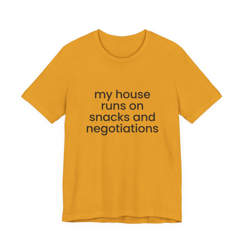 T‑Shirt — "My House Runs on Snacks and Negotiations" Funny Family Tee