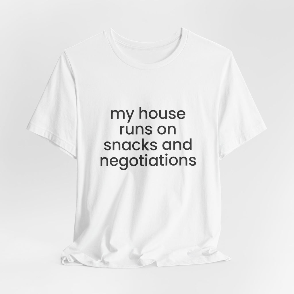 T‑Shirt — "My House Runs on Snacks and Negotiations" Funny Family Tee