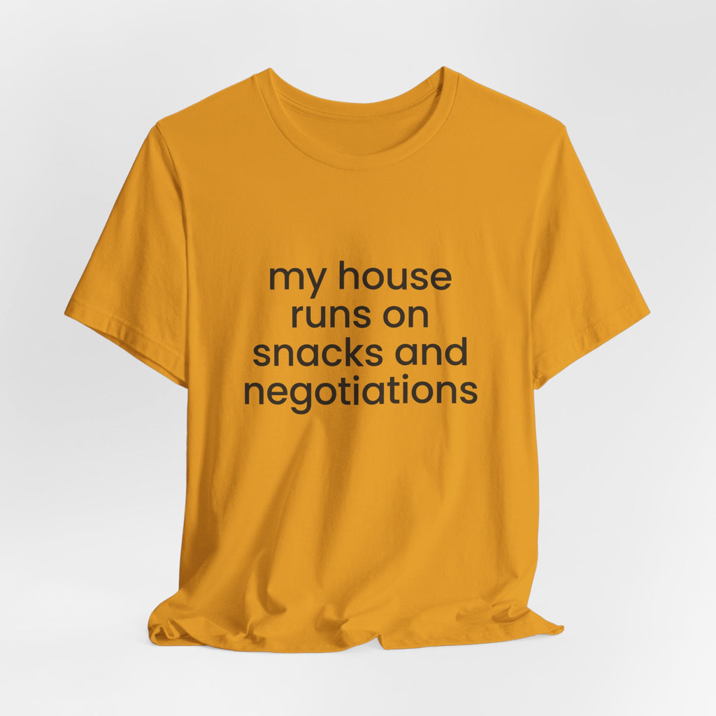 T‑Shirt — "My House Runs on Snacks and Negotiations" Funny Family Tee